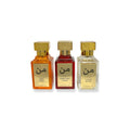 Three luxury perfume bottles labeled Spicy Amber, Forgotten Cherry, and Classic Rouge