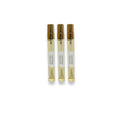 Three gold-capped Classic Rouge perfume sample vials with white labels on white background