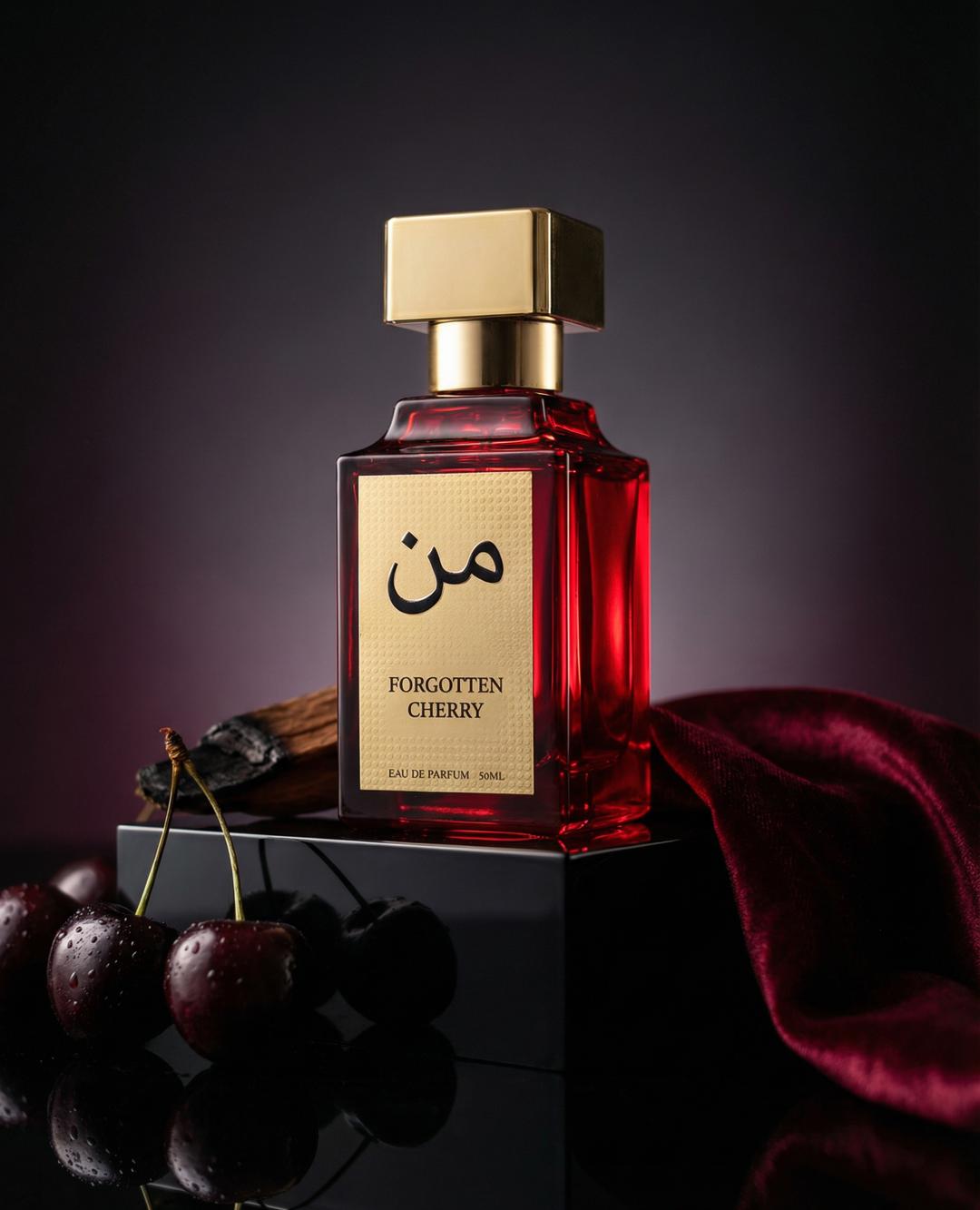 Luxury red perfume bottle labeled 'Forgotten Cherry' with gold cap, cherries, wood, and velvet.